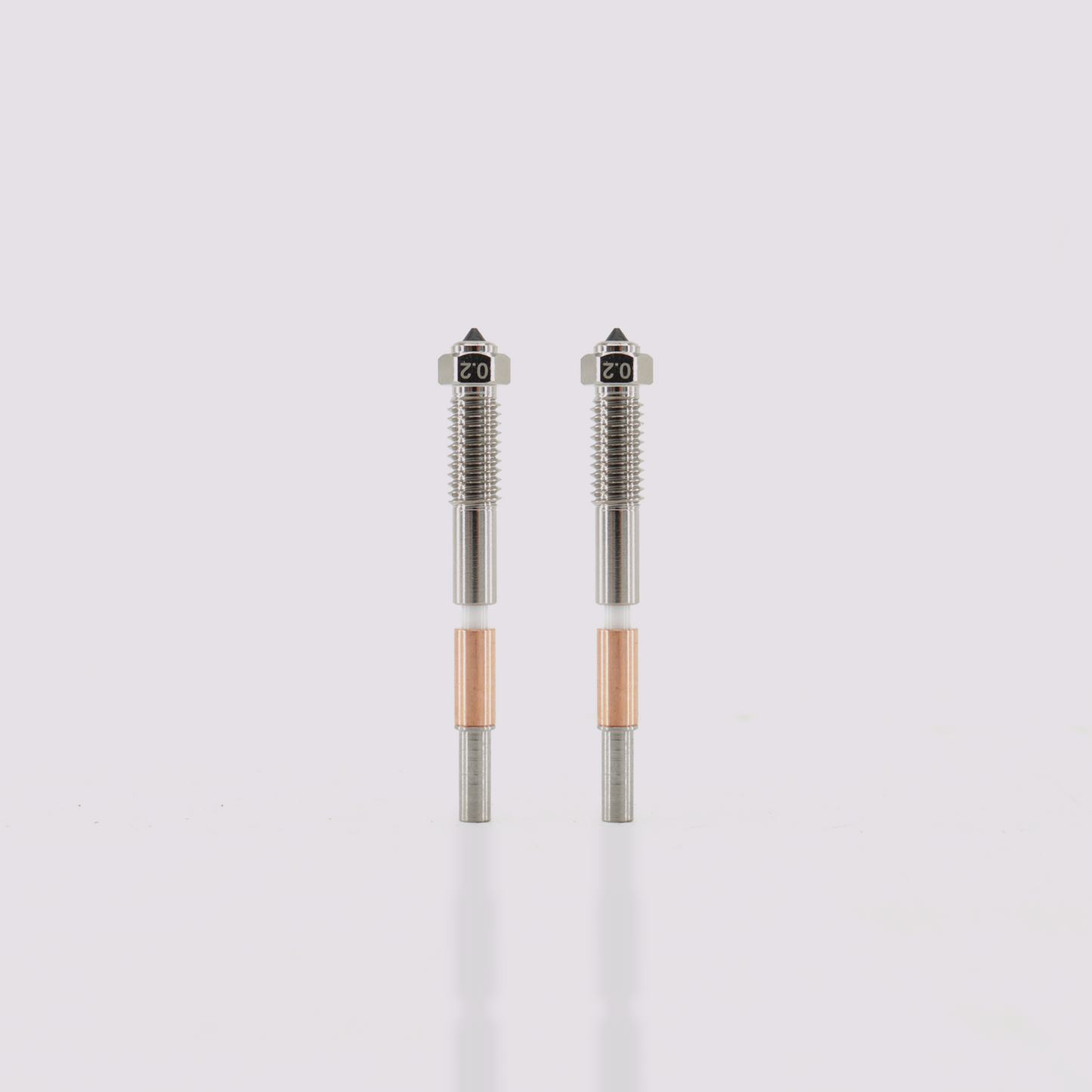 Two Q2 bimetal nozzles 0.2 mm tips with hardened steel core and copper-plated exterior