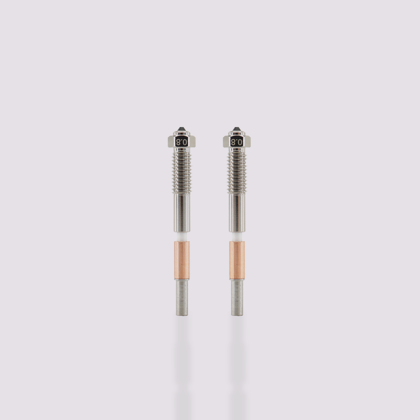 Two Q2 bimetal nozzles with 0.8 mm marking, featuring a silver threaded upper section and copper heat sink